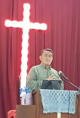 New Heights Ministry Director Jung Dangshing preaching in Mae Sariang Church.