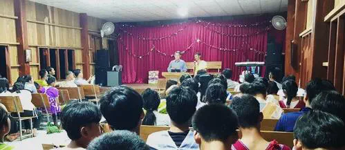 New Heights Ministry evangelist Sukchai translated Jung’s Thai into the Karen Language