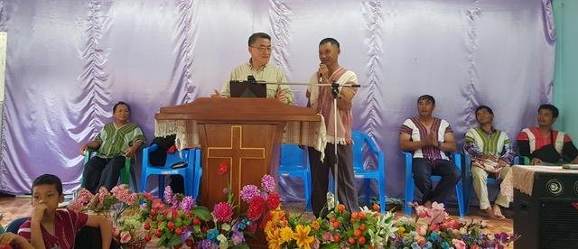 New Heights Ministry evangelist Sukchai translated Jung’s sermon into the Karen language at the Chomkitti church.  Sitting behind Jung are New Heights evangelists Tawi and Duangdee and two church leaders from the Chomkitti church. 