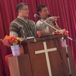 Jung (left) teaching and Sukchai, NHM Evangelist interpreting