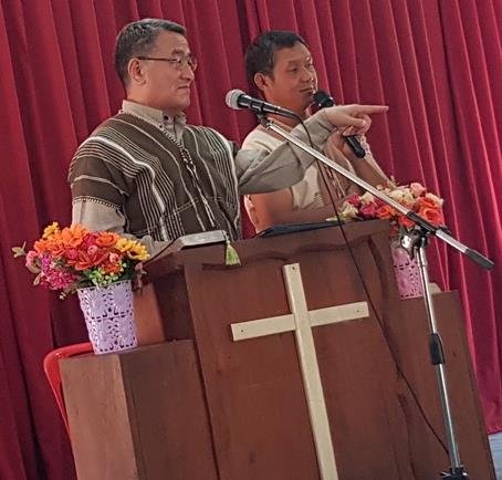 Jung (left) teaching and Sukchai, NHM Evangelist interpreting